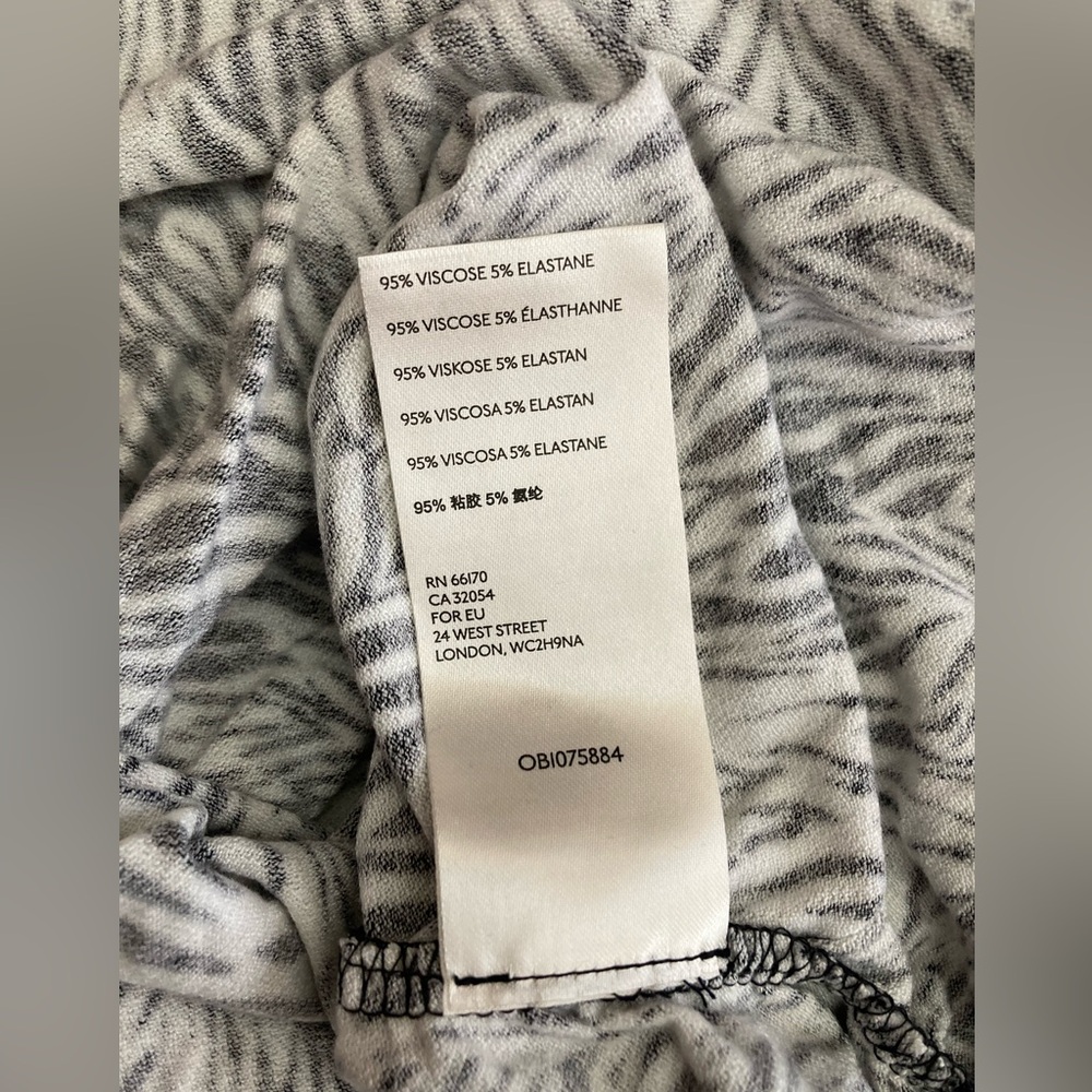 Free People | NWT Animal Print RacerBack Tank - Picture 10 of 10